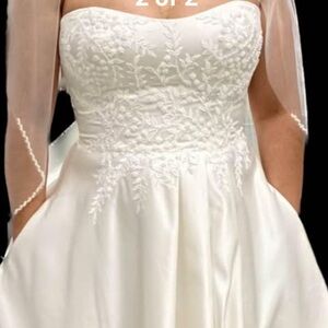 Elegant White Dress with Embroidered Details